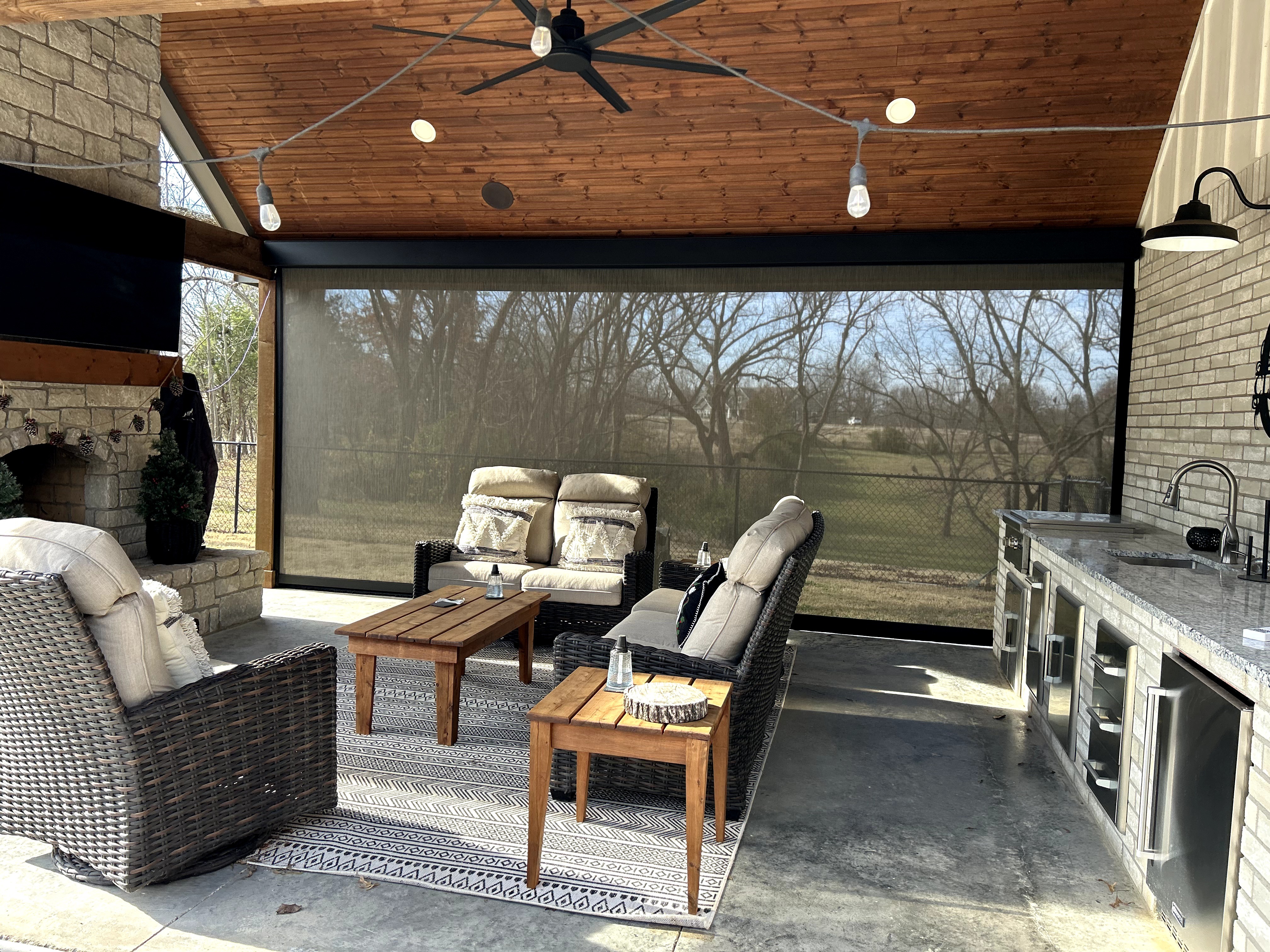 Poolside pergola with motorized shade